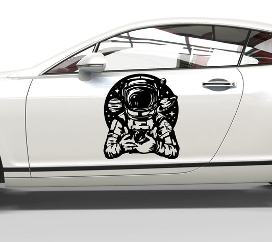 Autoaufkleber Astronaut mit Kamera